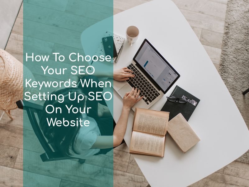 woman sitting on a laptop on a desk identifying How To Choose Your SEO Keywords When Setting Up SEO On Your Website