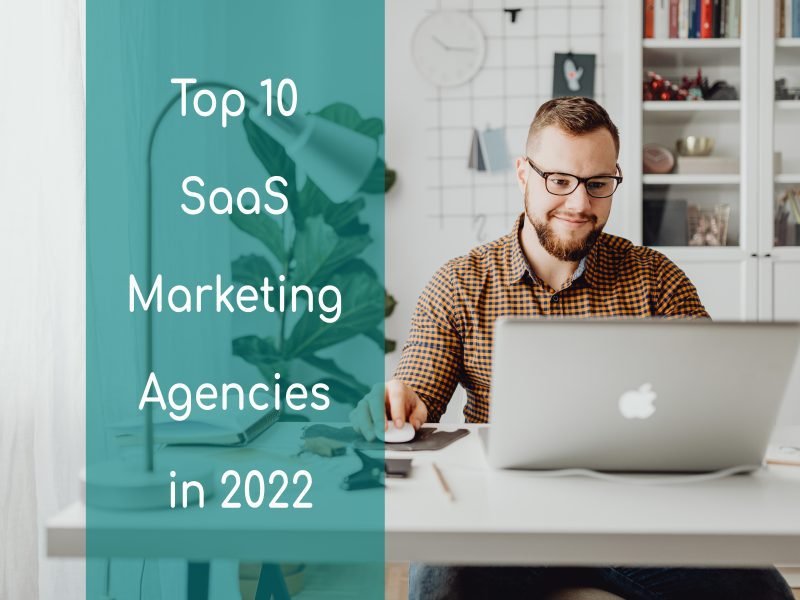 man on a laptop searching for the top 10 saas marketing agencies